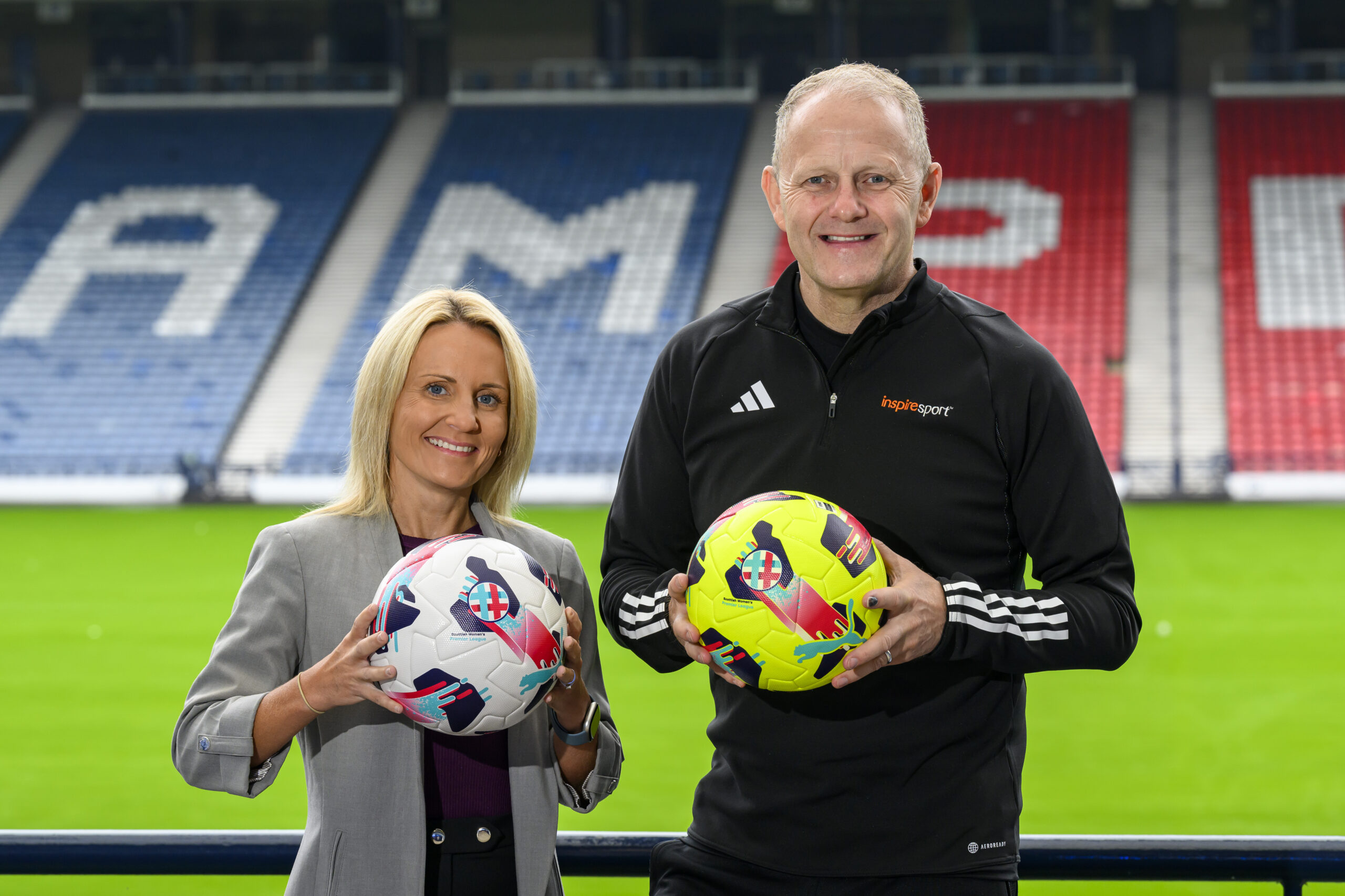 Fiona McIntyre, Managaing Director of the SWPL and Jed McCabe, inspiresport, Head of Sales for Northern Ireland and Scotland at the launch of the partnership between the SWPL and Inspire Sport at Hampden Park, Glasgow, Scotland on 16 July 2024.