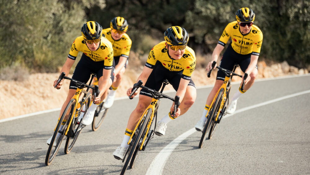 Four TVL riders during a road cycling race