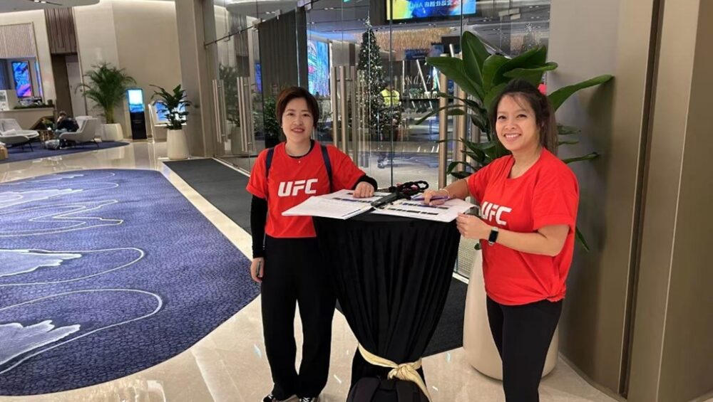 Destination Sport China greeting UFC guests at a hotel in Macau